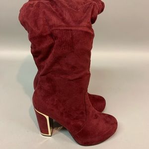 Torrid Knee High Heeled Boots.